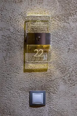 a wall with a box with the number on it at Stylish City Escape 1BD Apartment in Plovdiv in Plovdiv