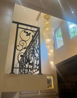 a chandelier and a chandelier hanging from a ceiling at Guest House Amaya Med 2 in Plovdiv