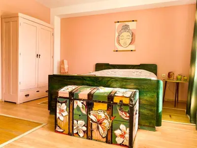 a bedroom with a bed in a room at Villa Madera - Spacious House with Swimming Pool, Sauna and Pool Table in Saparewo