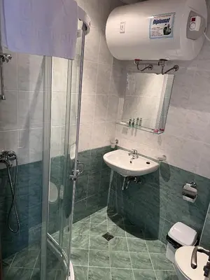 a bathroom with a shower and a sink at Flat F6 Bansko Rentals in Bansko
