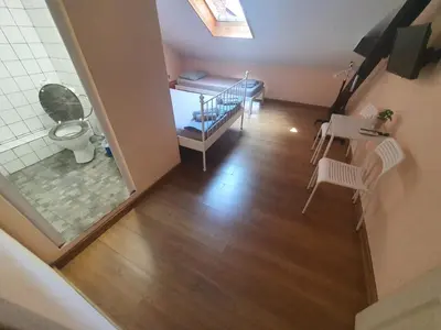an overhead view of a bathroom with a toilet in a room at Let's Go Party - Plovdiv Center in Plovdiv