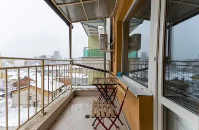 a balcony with a bench and a view at Lovely Central 1 Bedroom Condo in Sofia in Sofia