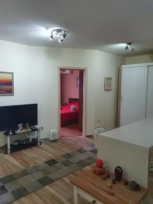 a living room with a room with a bed in it at Sofia escape in Sofia