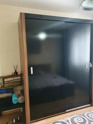 a large glass door in a room with at Sofia escape in Sofia