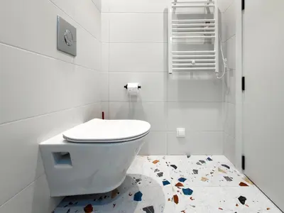 a white bathroom with a toilet and a shower at Little Sugar Home in Sofia