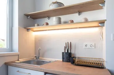 a kitchen with a sink and a counter top at Old Town Bijou in Sofia