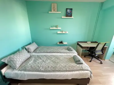 a blue bedroom with a bed and a desk at Lima 2BDR cozy Apt near Business Park w Work Desk in Sofia