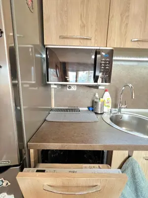 a kitchen with a sink and a microwave at Lima 2BDR cozy Apt near Business Park w Work Desk in Sofia