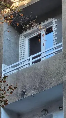 a window on the side of a building at Cozy spot at the heart of Sofia in Sofia