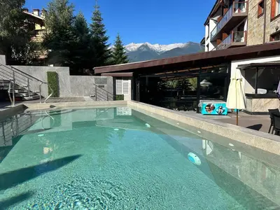 a swimming pool in the middle of a building at St Ivan Rilski Spa & Pool Getaway in Bansko