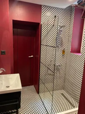 a bathroom with a shower and a sink at Apartment City by Wohnsol-mit Terrasse im Centrum in Sofia