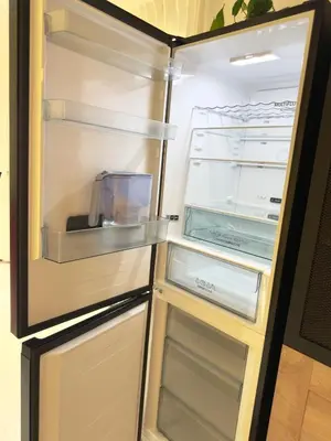 an empty refrigerator with its door open in a kitchen at Sofia 3-Bedroom Mountain Family Apartment with Free Parking in Sofia