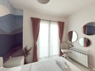 a bedroom with a bed and a window at Sofia 3-Bedroom Mountain Family Apartment with Free Parking in Sofia