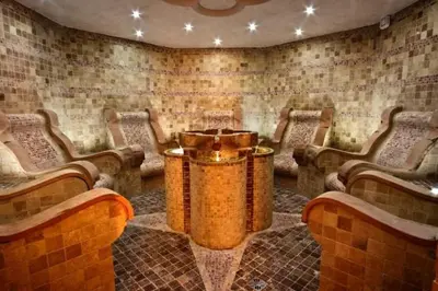 a room with chairs and a table in a room at Grand Monastery 3 Apartment 10 in Pamporovo