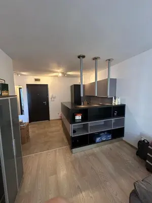 a living room with a dresser in a room at GALAXY apartment in Sofia