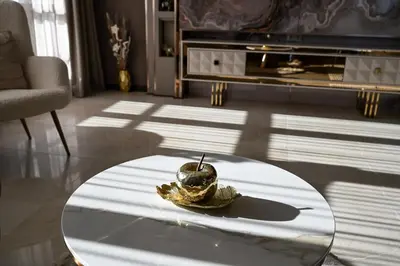 a living room with a glass table with a bowl on it at All Seasons Apartment 2 in Sofia