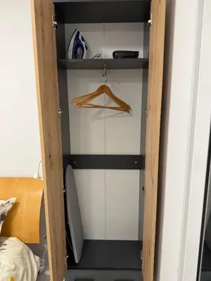 a closet with black and white stripes in a room at Botev MiniHub Hub 1 Modern Studio at Botev 88 in Sofia