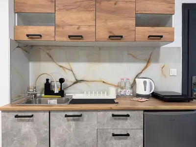 a kitchen with a sink and a counter top at Botev MiniHub Hub 1 Modern Studio at Botev 88 in Sofia