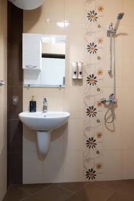 a bathroom with a sink and a shower at Апартамент за гости НИКОЛОВА in Plovdiv