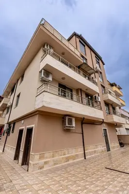 a building with balconies on the side of it at City Home Sandanski in Sandanski