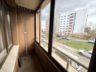 a room with a window with a view of a street at Harmony Apartment by 7th Sence in Sofia