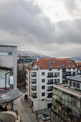 an aerial view of a city with buildings at Flower garden in Lozenetz by 7th Sence in Sofia