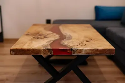 a wooden coffee table sitting on top of a table at 1 minute to main Street Grafa, NDK, FREE Parking, 3BDR in Sofia