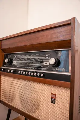 an old radio sitting on top of a table at Big Apartment in Center Sofia - 2 BD - Fireplace in Sofia