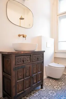 a bathroom with a sink and a toilet at Big Apartment in Center Sofia - 2 BD - Fireplace in Sofia