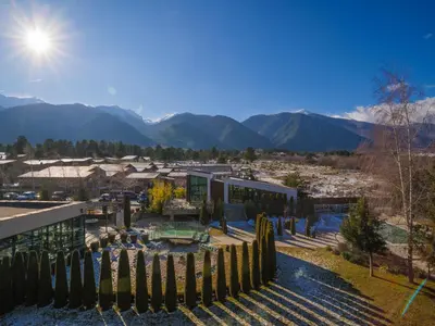 a view of a city with mountains in the background at Apartment with an amazing view - near Bansko in Razlog