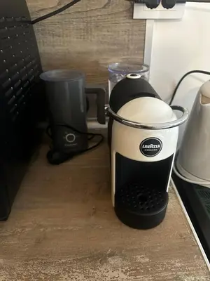 a coffee maker is sitting on a counter at Winter Lotos Apartment Pamporovo in Pamporovo