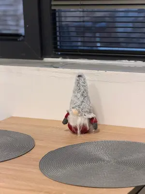 a small toy is sitting on the floor next to a window at Botev MiniHub Hub 2 Modern Studio at Botev 88 in Sofia