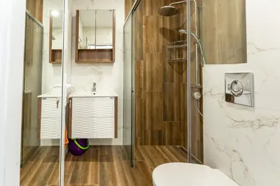 a bathroom with a shower and a sink at Bright and Cozy Apartment at a quiet Location in Sofia