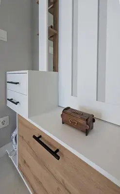 a bathroom with a white counter with a wooden drawer at Olive Urban Apartment, Free Parking in Sofia