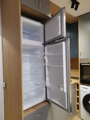 a refrigerator with its door open in a kitchen at West Park in Sofia