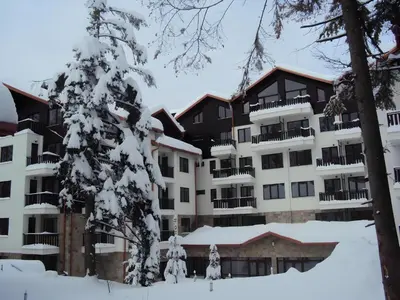 an apartment building in the winter with snow at RIA studio in Borovets Gardens hotel in Borovets