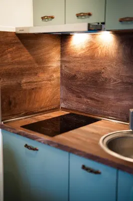 a kitchen with a wooden counter top with a sink at 400m from Ski lift Belvedere Apartment - SPA - Free parking in Bansko