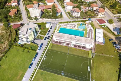 an aerial view of a tennis court with a court at Complex Europe in Dolna Banya