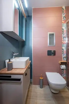 a bathroom with a sink and a toilet at Plovdiv ArtNest - 1-Bedroom Cozy Apartments in Plovdiv