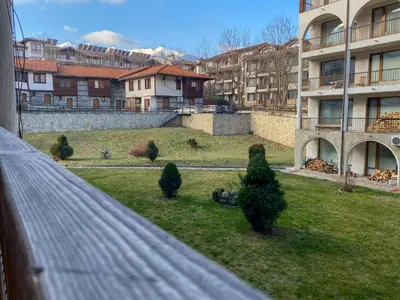 a view of a yard with trees and buildings at Private Studio 500m from Gondola in Bansko
