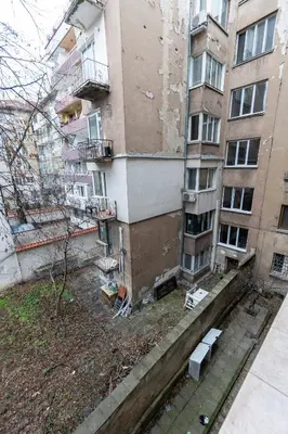 an outside view of an apartment building with a yard at Gurko Finest in Sofia