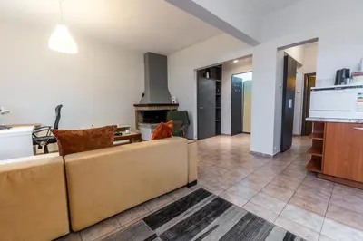 a living room with a couch and a fireplace at Gurko Finest in Sofia