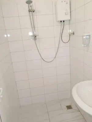 a bathroom with a shower and a sink at GuestHouse1 Karma369 in Plovdiv