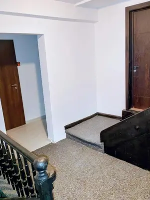 an empty room with a staircase and a door at GuestHouse3 Karma369 in Plovdiv