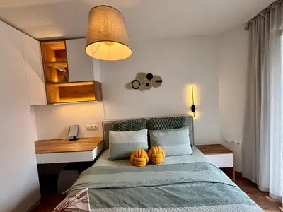 a bedroom with a bed with two pumpkins on it at Casa Brisa by Vistay Residences Apartment Sofia - with Free Secured Parking in Sofia