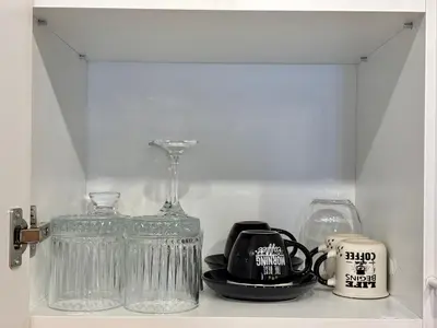 a shelf with a glass blender and a tea kettle at Casa Brisa by Vistay Residences Apartment Sofia - with Free Secured Parking in Sofia