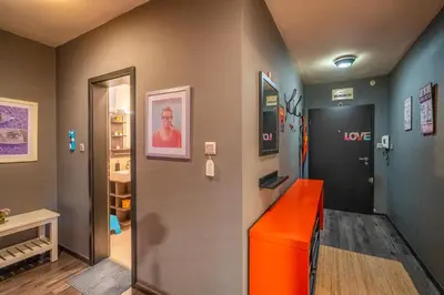 a hallway with an orange bench in a room at Free parking 1BR Tokuda Lozenets in Sofia