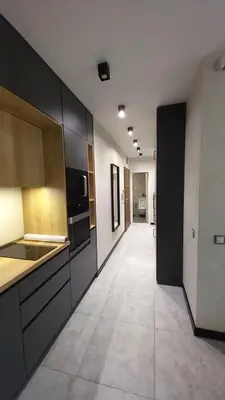 a kitchen with a long hallway with a kitchenasteryasteryasteryasteryasteryasteryastery at ATM apart Lagera in Sofia