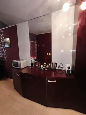 a kitchen with a counter top and a microwave at Iceberg Studio 15 in Borovets