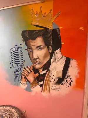 a painting of a man with a crown on his head at MOTEL Route 80 in Bozhurishte
